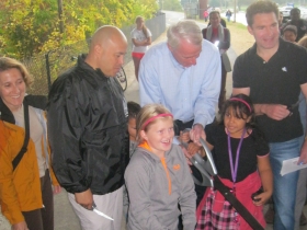 Kristen Bennet, Ald. Jose Perez, Mayor Tom Barret, and Ald. Tony Zielinski with help from some children cut the ribbon.
