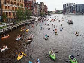 About 70 paddlecraft followed the Funktoon during the Milwaukee River Roundup sponsored by Milwaukee Kayak Company with support from Joy Engine on June 12, 2024. View is south from the St. Paul Street Bridge.