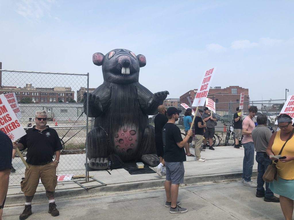 The signs from this protest read, "Fiserv Forum Bucks Workers." Photo taken August 26th, 2018 by Jeramey Jannene.