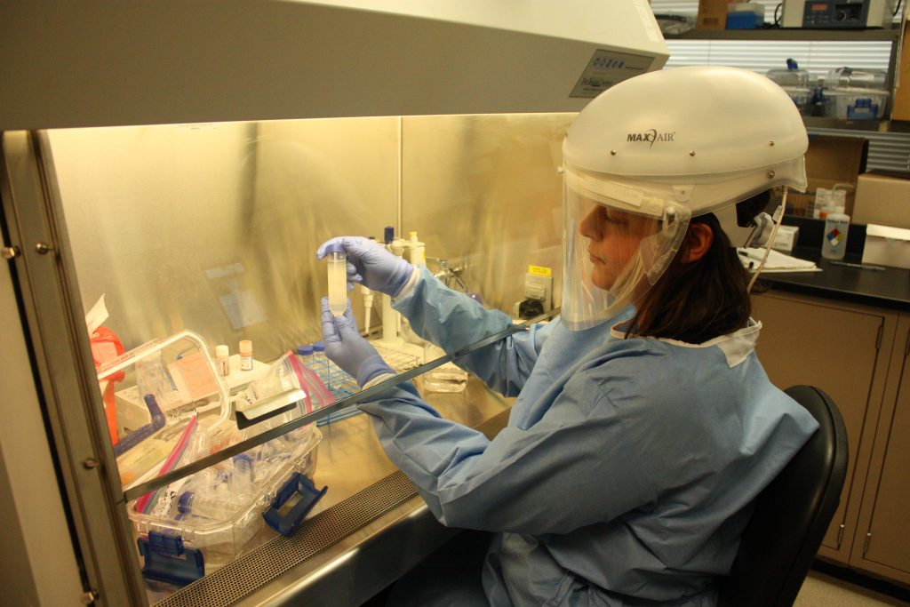 Lab worker at the Milwaukee Health Department laboratory. Image from the Milwaukee Health Department,